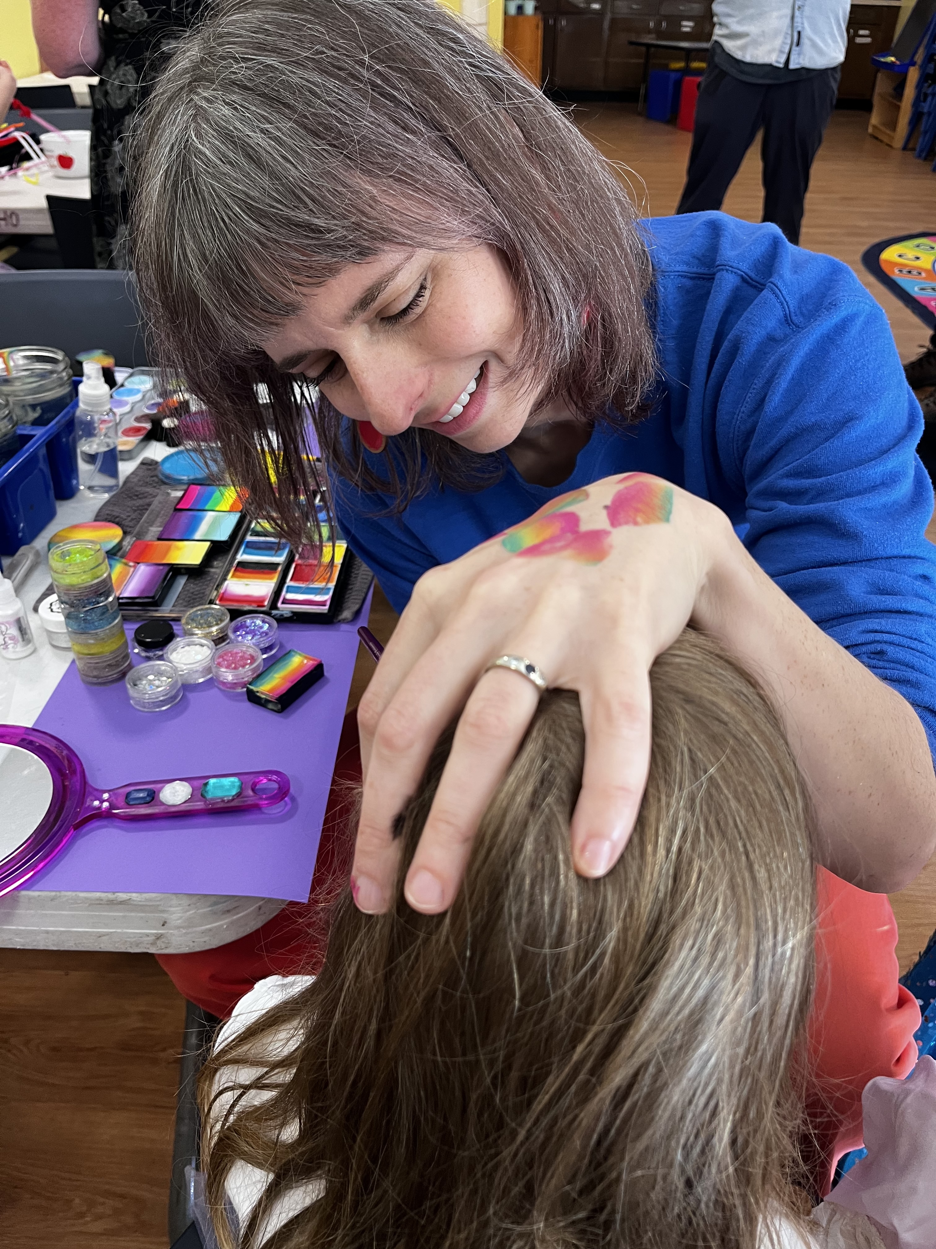 Face painting by Sparkle Motion