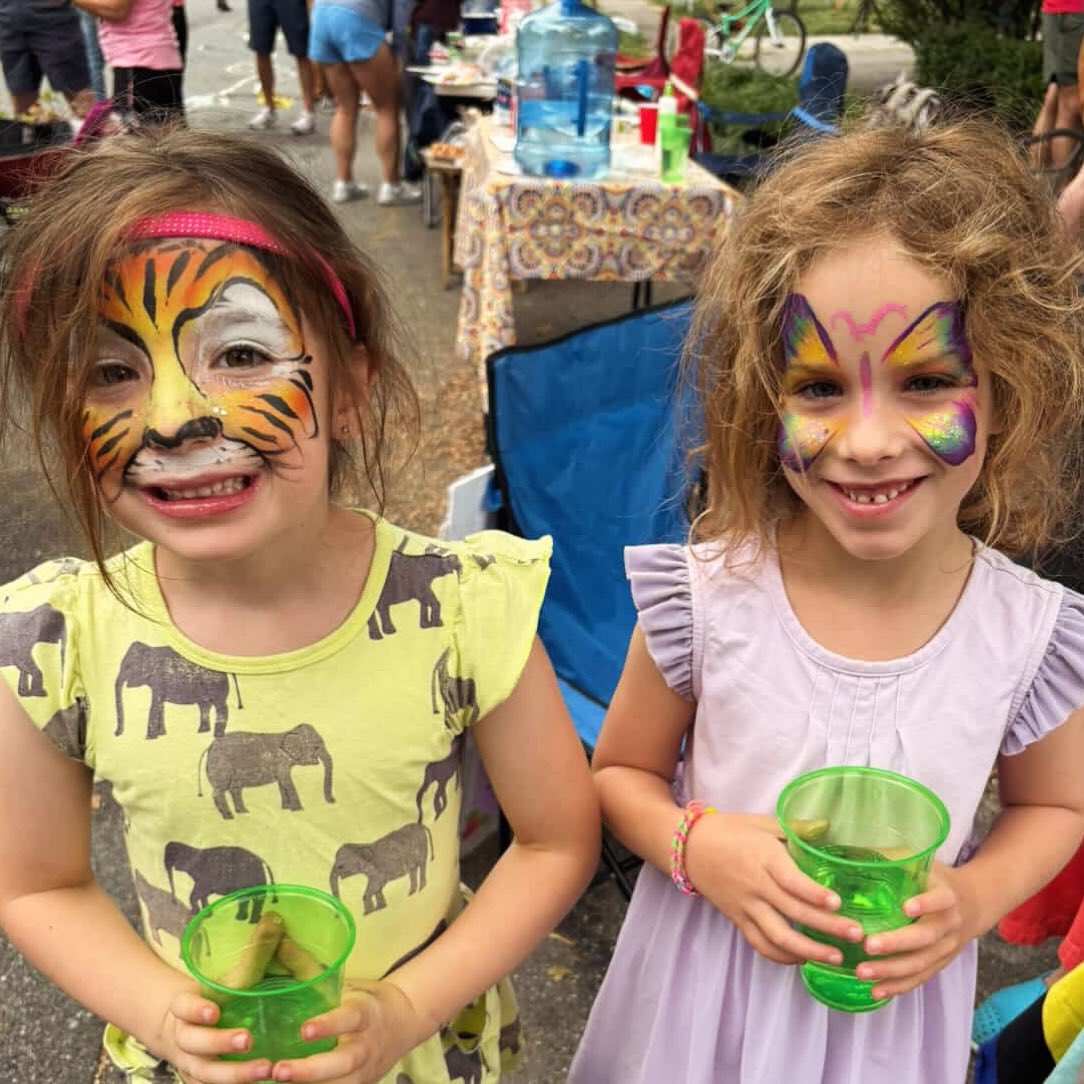 Face painting by Sparkle Motion