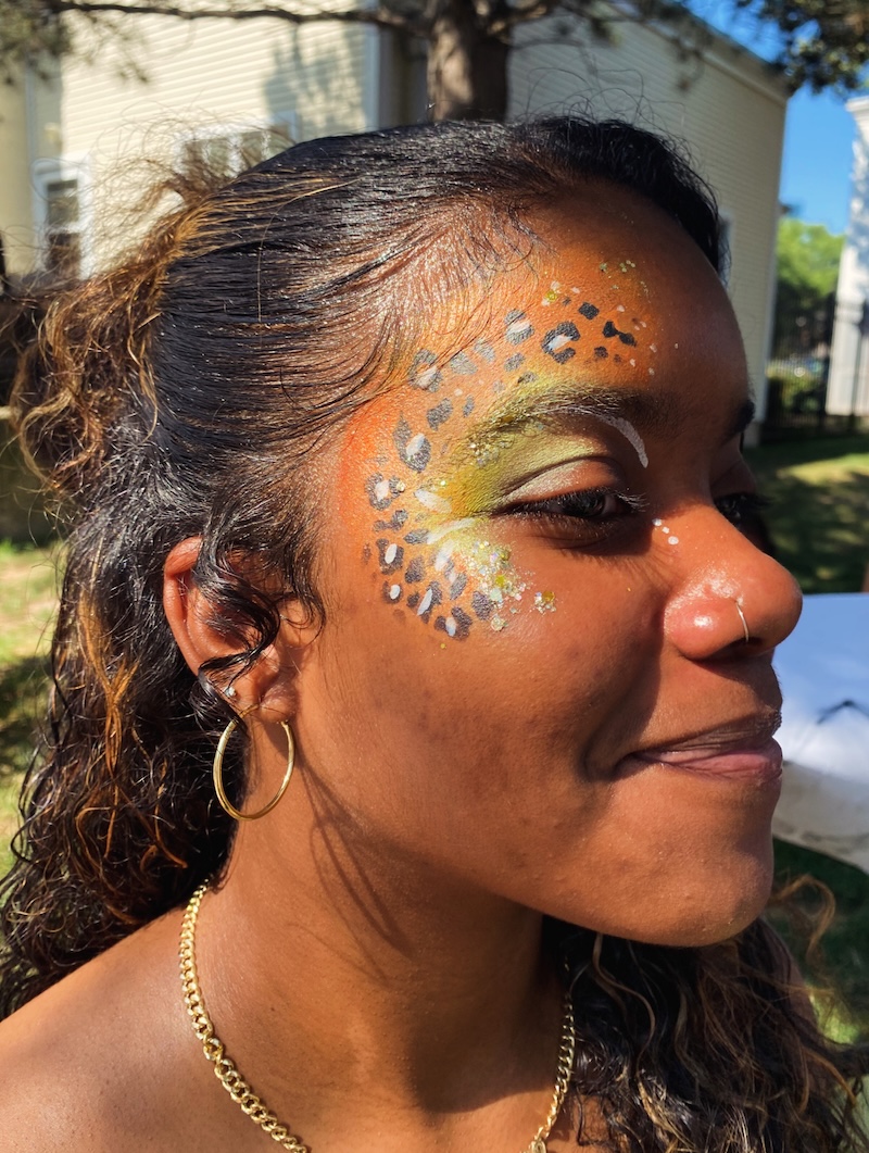 Face painting by Sparkle Motion