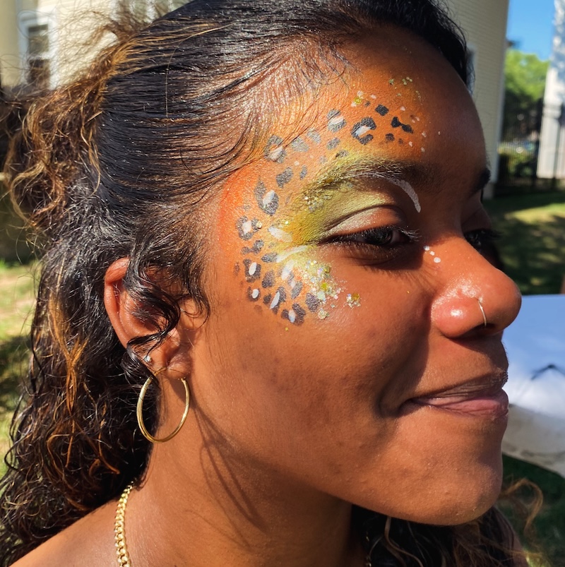 Face painting by Sparkle Motion