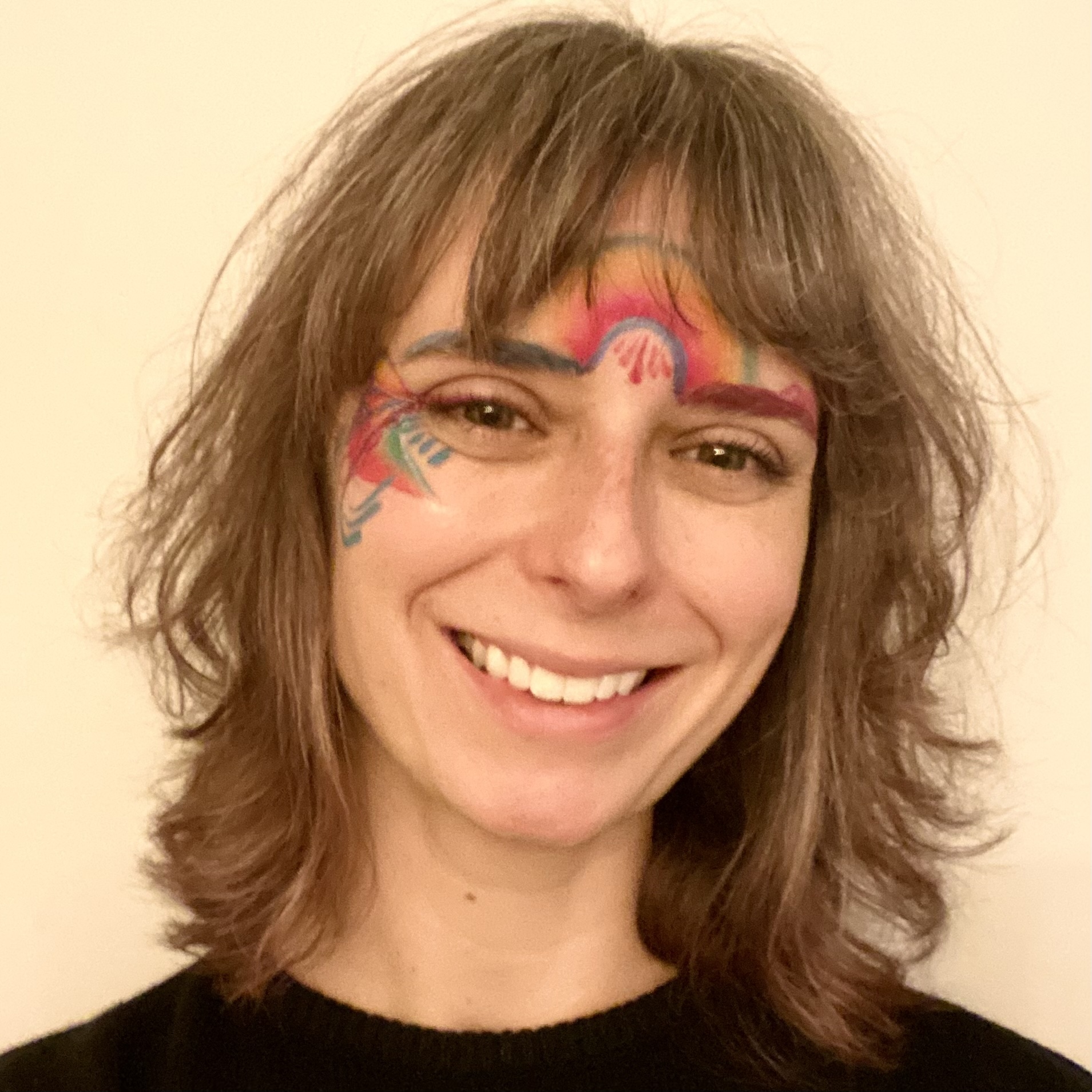 Face painting by Sparkle Motion