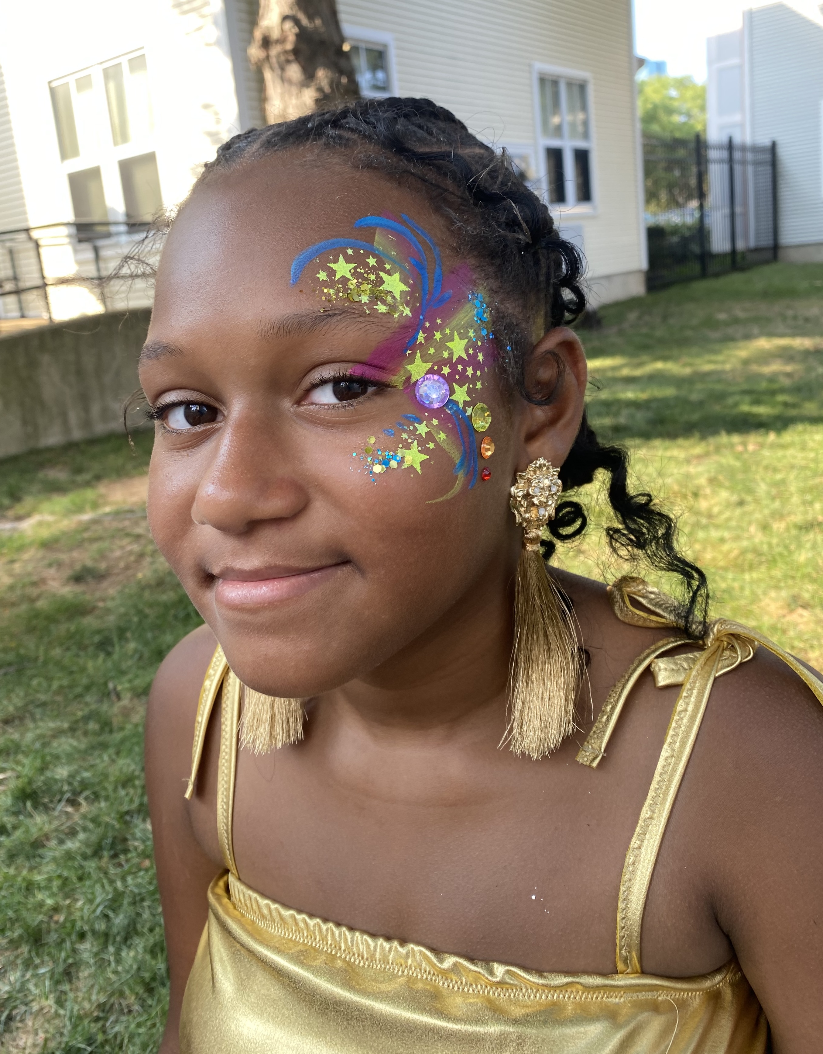 Face painting by Sparkle Motion