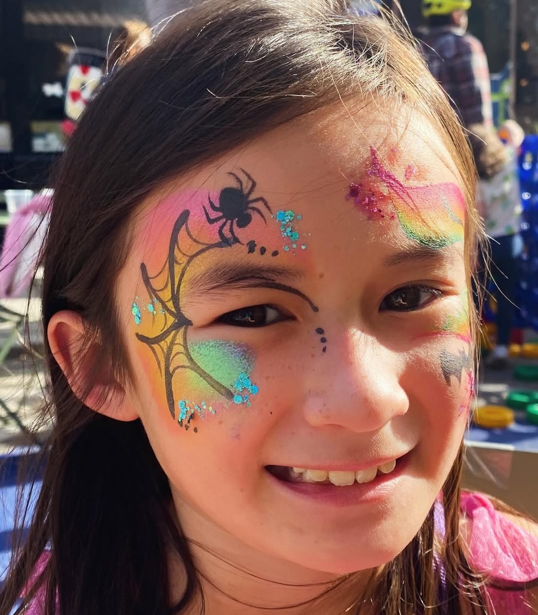 Face painting by Sparkle Motion