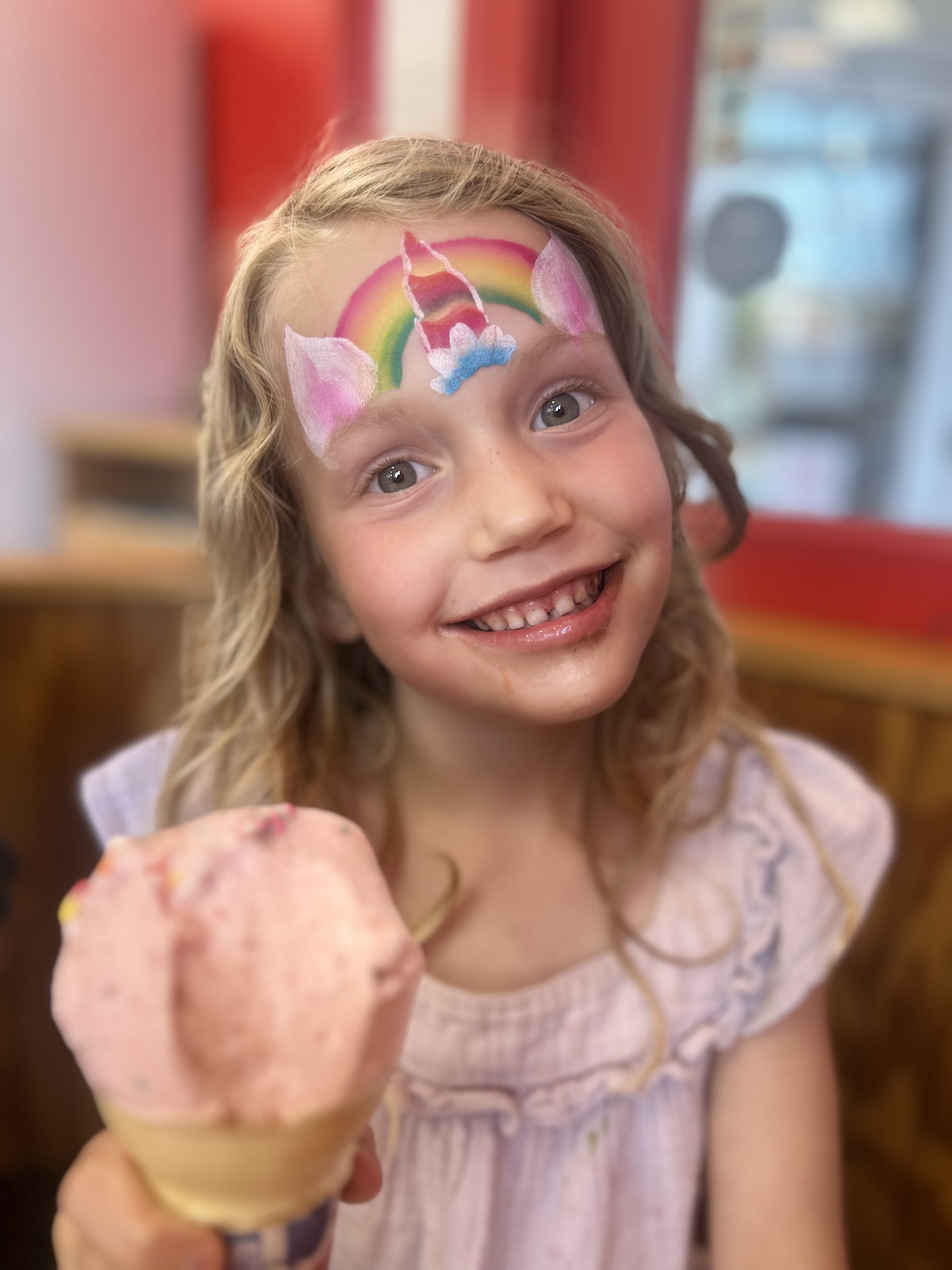 Face painting by Sparkle Motion